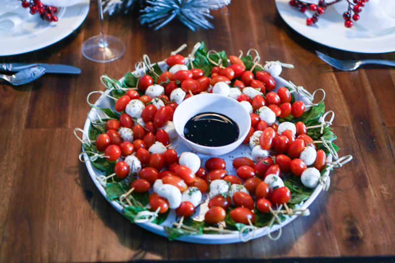 Christmas Wreath Caprese Salad Recipe featured by top Houston foodie blog Lone Star Looking Glass