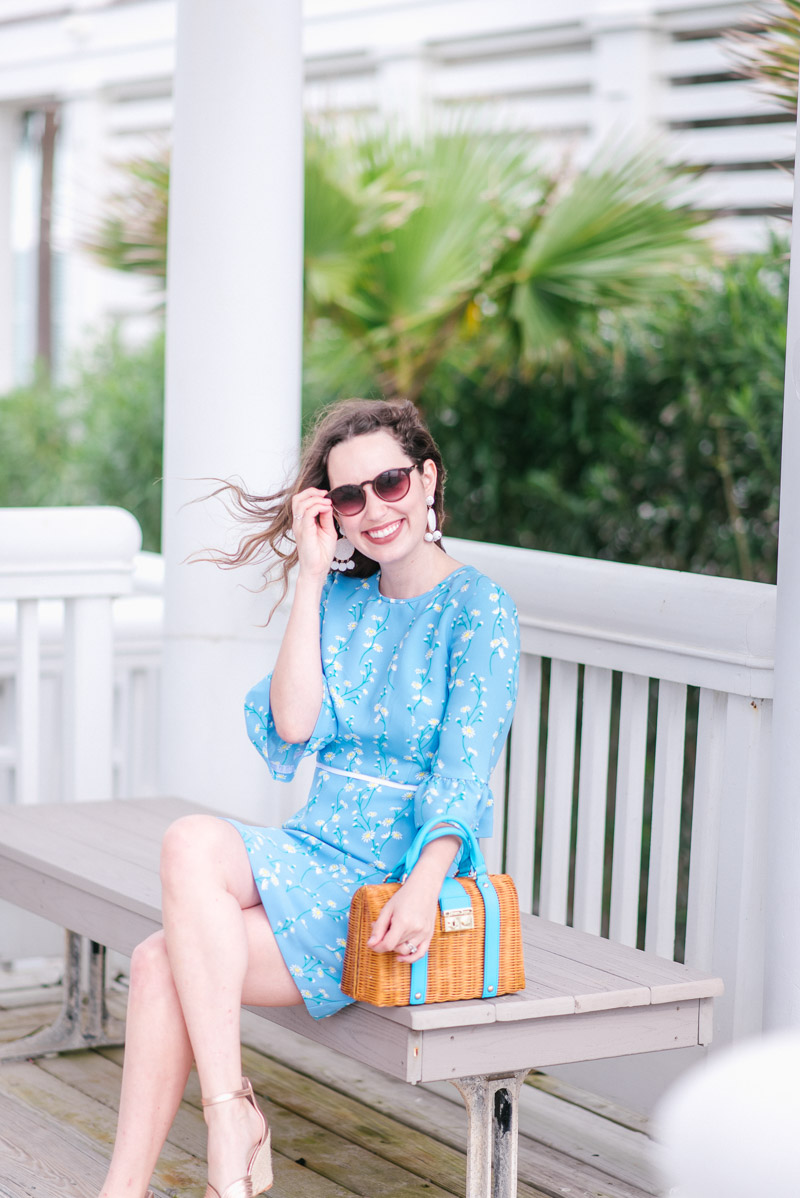 Things to Do in Houston in The Spring featured by top Houston blog Lone Star Looking Glass; Image of a woman wearing Draper James Vine Rosslyn Sundress and Draper James bag.