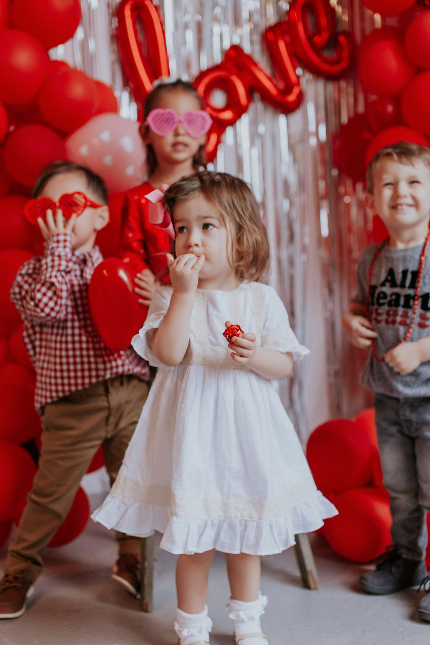 5 Valentine's Day Activities for Toddler to Make Valentine's Day Special featured by top US lifestyle blog, Lone Star Looking Glass: image of children at a Valentine's Day party