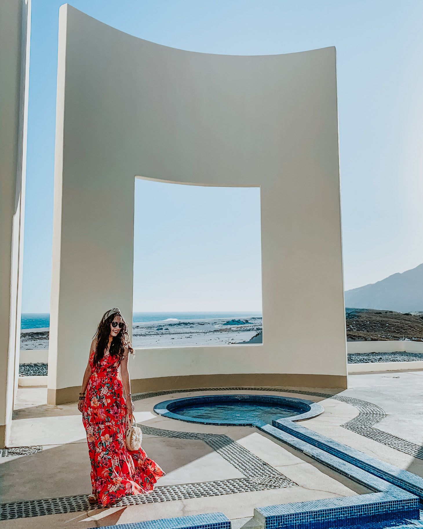 Pueblo Bonito Pacifica: 8 Reasons to Vacation in Cabo by popular Tennessee travel blog, Lone Star Looking Glass: image of a woman outside at the Pueblo Bonito Pacifica. 