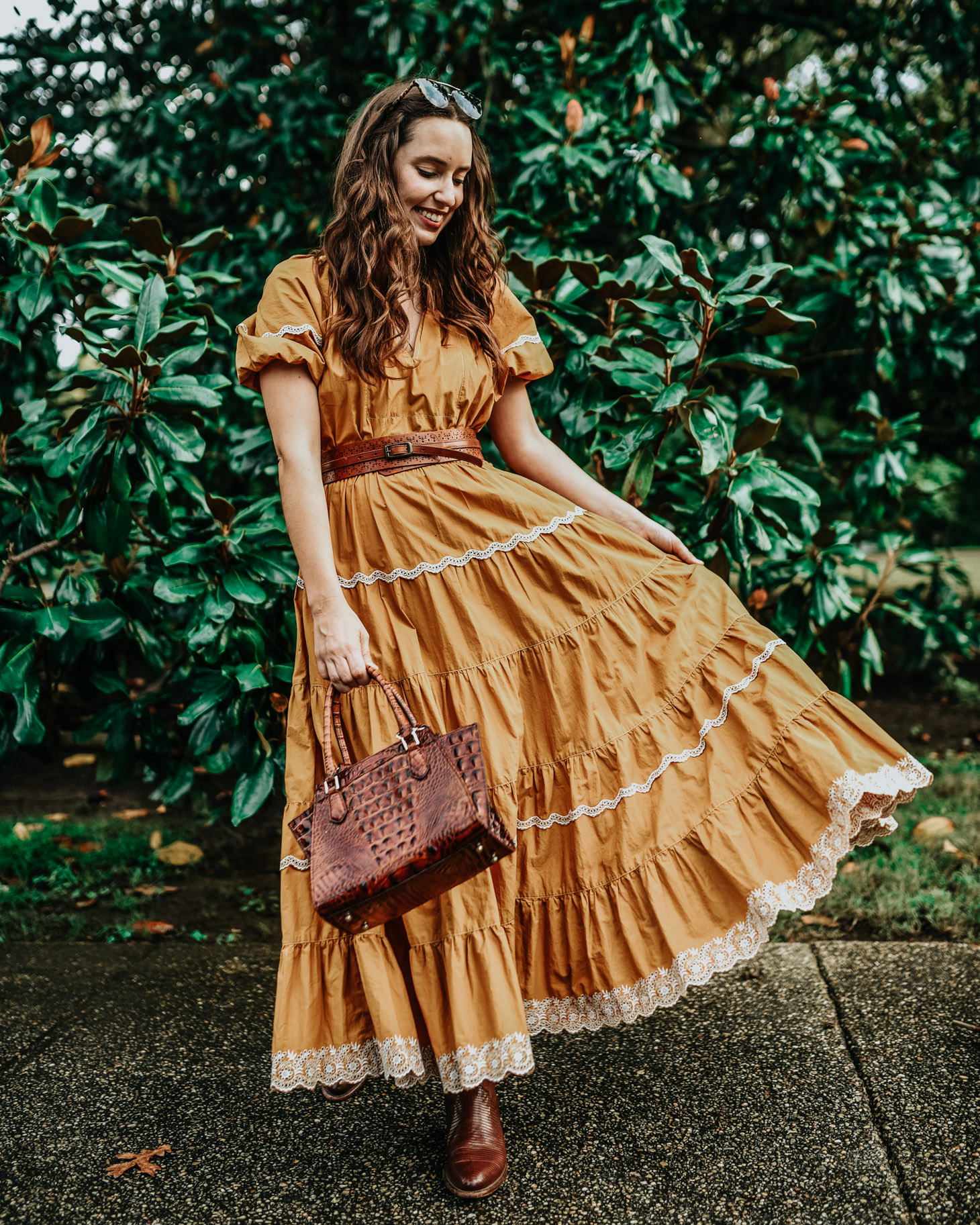 A Bold Yellow Maxi Dress for Fall by Popular Tennessee fashion blog, Lone Star Looking Glass: image of a woman standing outside and wearing a Ulla Johnson Claribel Dress..