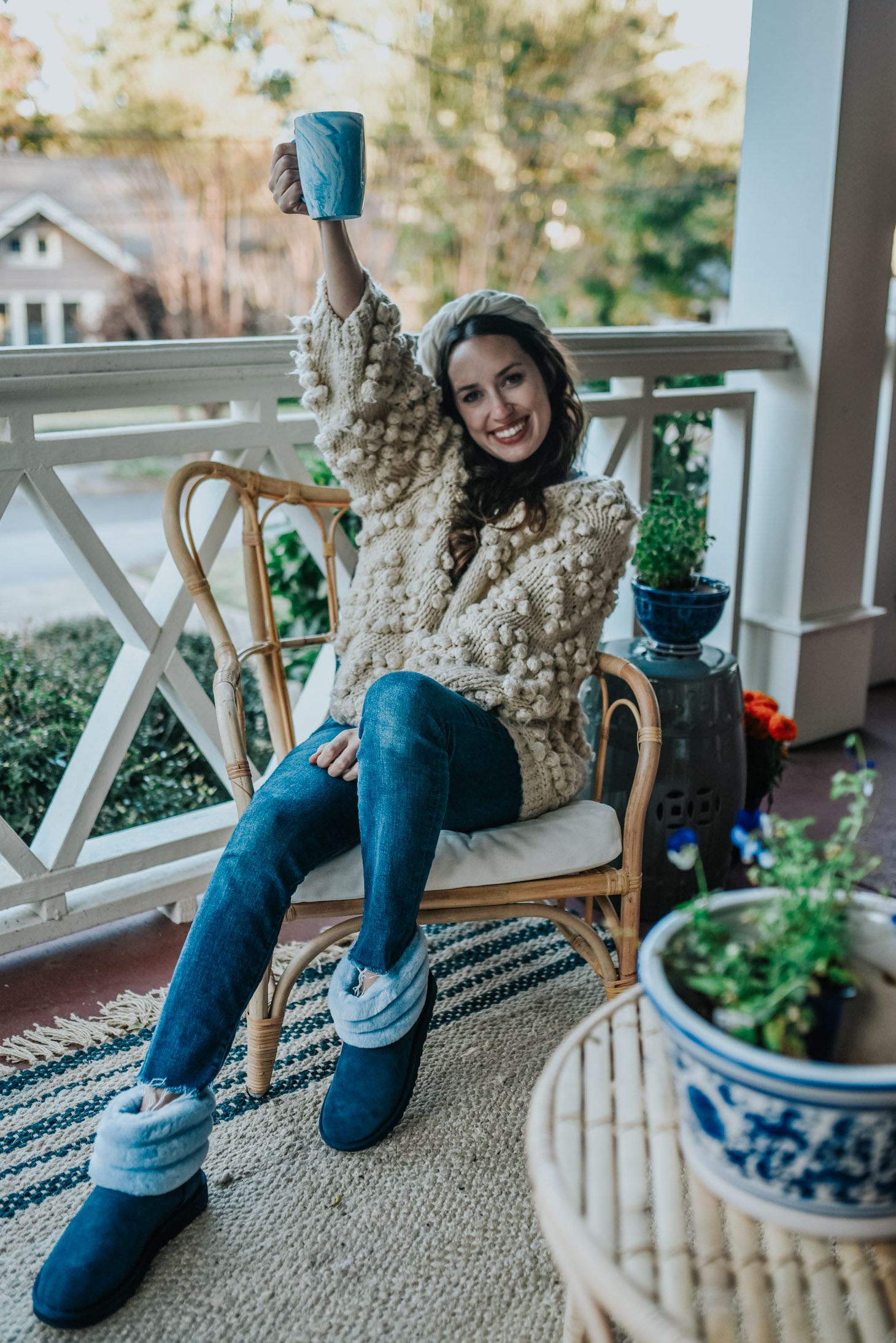 Cozy fall essentials featured by top US life and style blog, Lone Star Looking Glass: image of a woman wearing Navy UGG Boots from Zappos