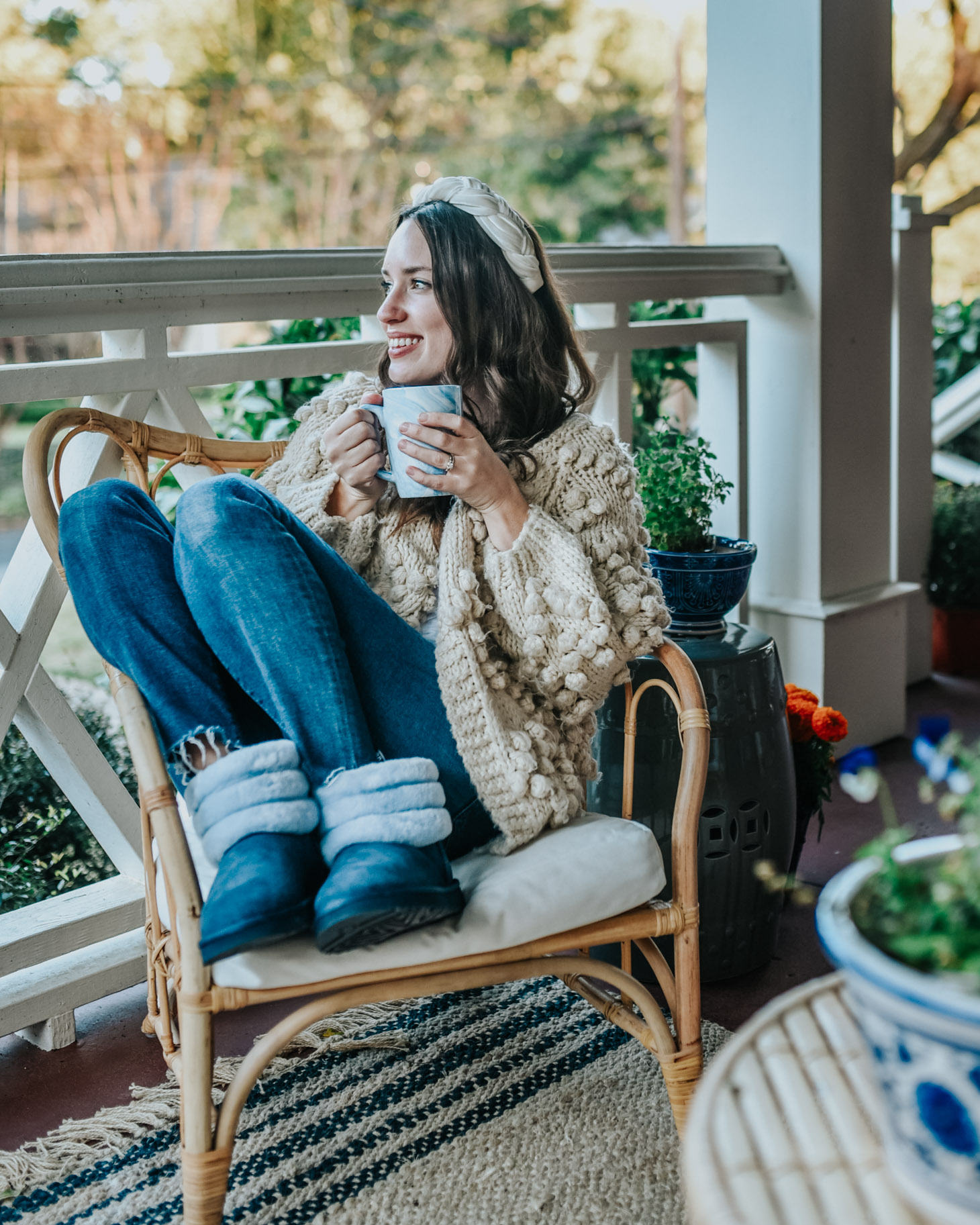 Cozy fall essentials featured by top US life and style blog, Lone Star Looking Glass: image of a woman wearing Navy UGG Boots from Zappos