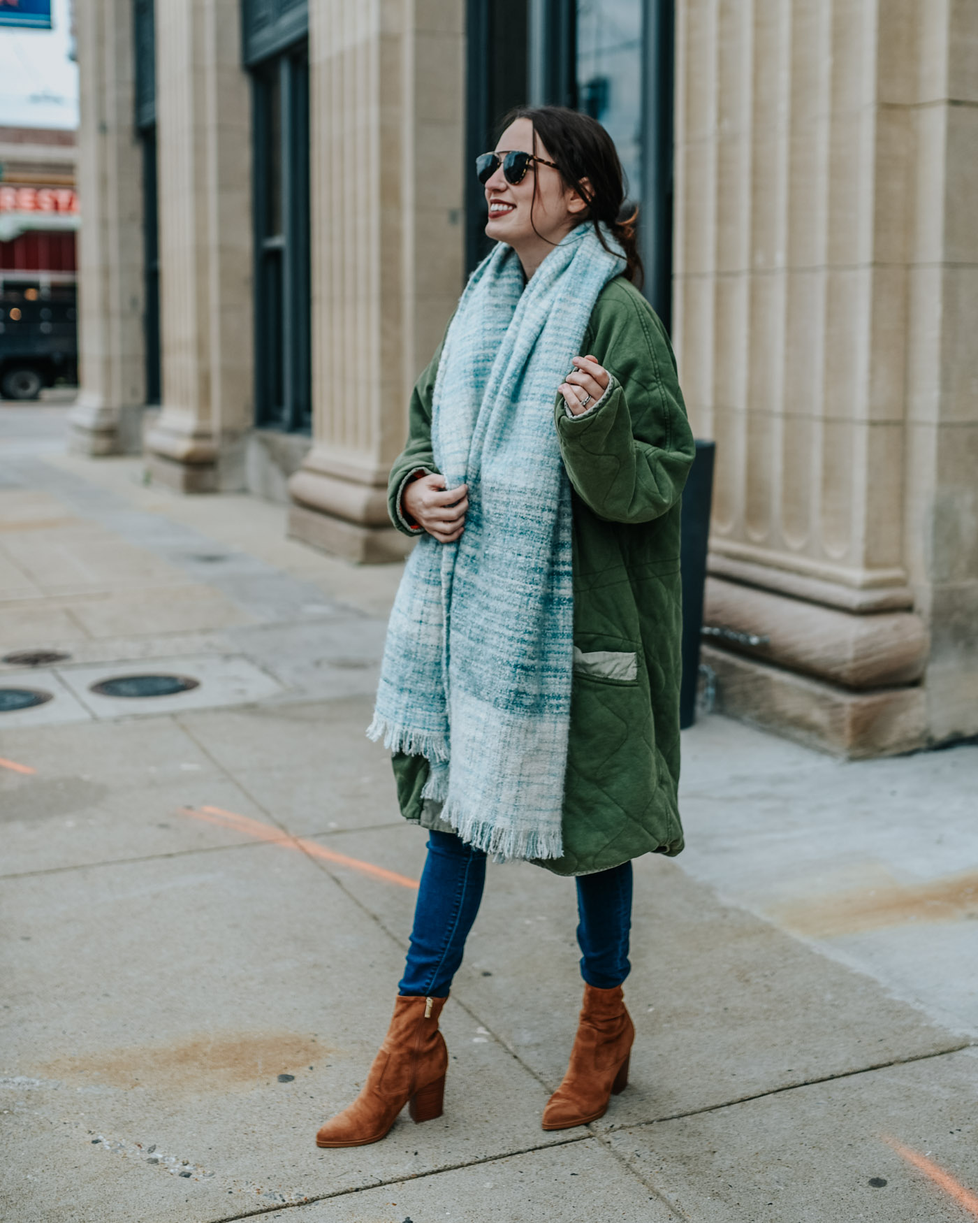 Nuuly Review: Renting Clothes from Anthro & Free People by popular Tennessee fashion blog, Lone Star Looking Glass: image of a woman wearing Nordstrom Marc Fisher LTD Avalyn Bootie, ShopBop MOTHER Stunner Ankle Fray Jeans, and Anthropologie Whittaker Plaid Scarf.