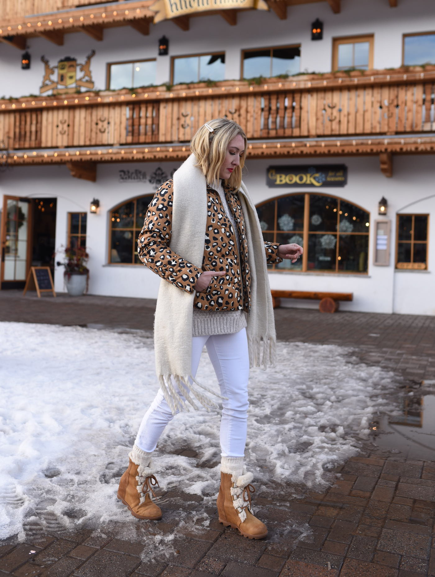 Leopard Puffer Jacket styled for Winter by top Memphis fashion blog, Lone Star Looking Glass: image of a woman wearing a Who What Wear leopard puffer jacket.