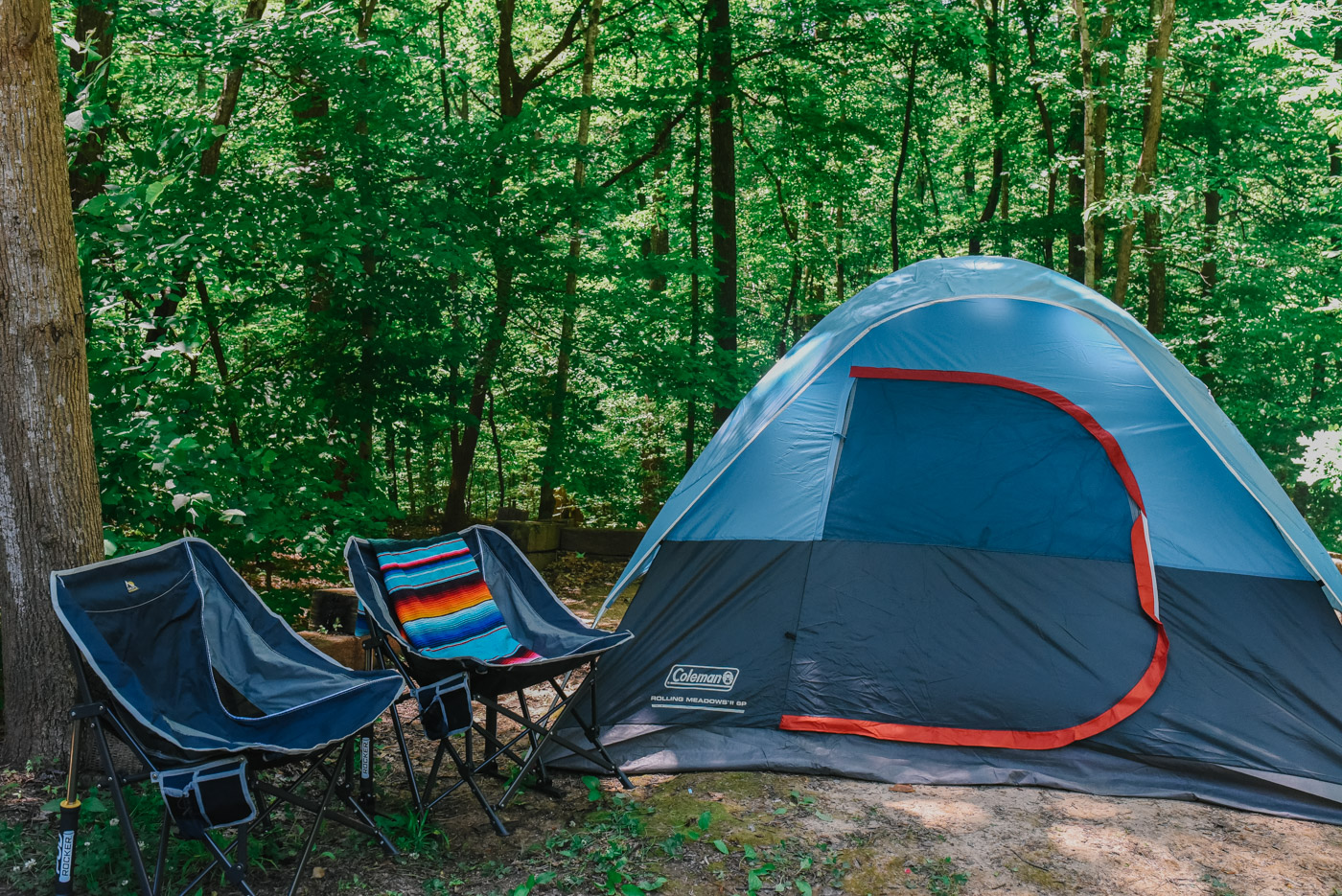 Father's Day Gift Ideas by popular Memphis lifestyle blog, Lone Star Looking Glass: image of a Coleman tent and two pod rocker chairs. 