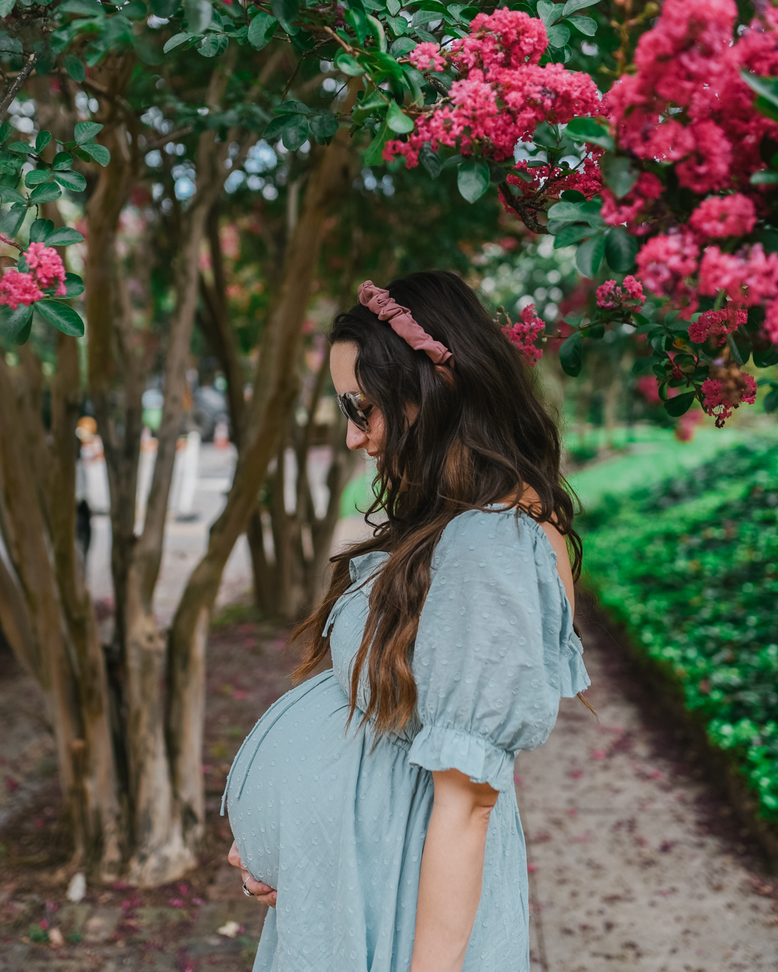 Midi Dress by popular Memphis fashion blog, Lone Star Looking Glass: image of a woman standing outside by a pink flowering bush and wearing a Amazon R.Vivimos Women Summer Half Sleeve Cotton Ruffled Vintage Elegant Backless A Line Flowy Long Dresses and Anthropologie Skye Braided Headband.