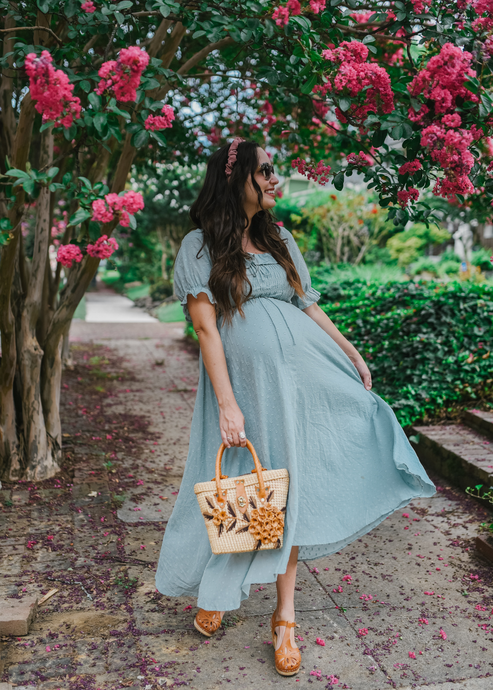 Midi Dress by popular Memphis fashion blog, Lone Star Looking Glass: image of a woman standing outside by a pink flowering bush and wearing a Amazon R.Vivimos Women Summer Half Sleeve Cotton Ruffled Vintage Elegant Backless A Line Flowy Long Dresses and Anthropologie Skye Braided Headband.