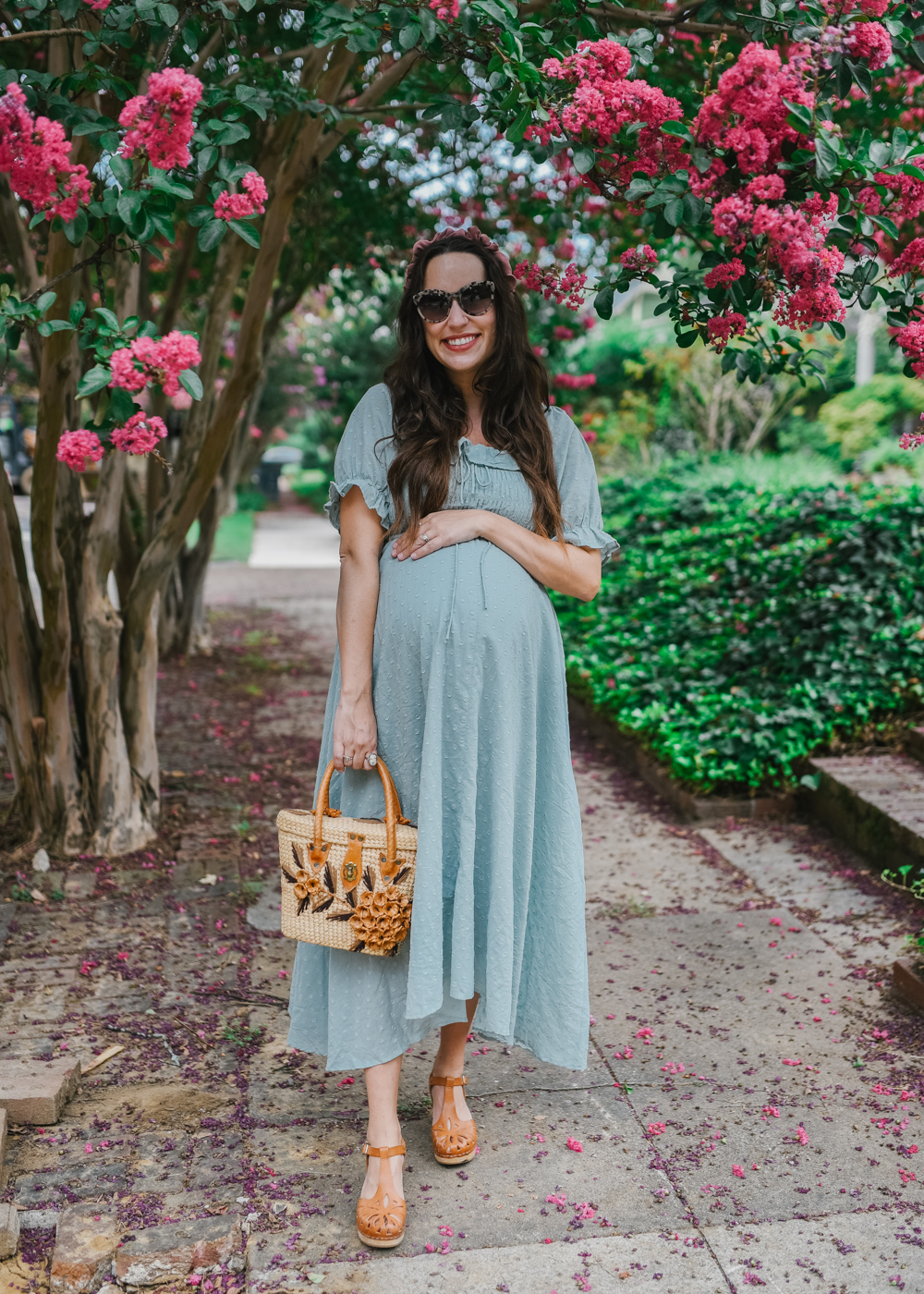 Midi Dress by popular Memphis fashion blog, Lone Star Looking Glass: image of a woman standing outside by a pink flowering bush and wearing a Amazon R.Vivimos Women Summer Half Sleeve Cotton Ruffled Vintage Elegant Backless A Line Flowy Long Dresses and Anthropologie Skye Braided Headband.