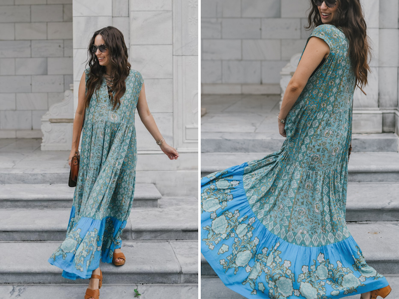 Bohemian Maxi Dresses by popular Memphis fashion blog, Lone Star Looking Glass: image of a woman standing on some grey marble steps outside and wearing a Free People Western Cuff Set, Free People Hanalei Bay Dress, and Zappos Swedish Hasbeens Kringlan. 