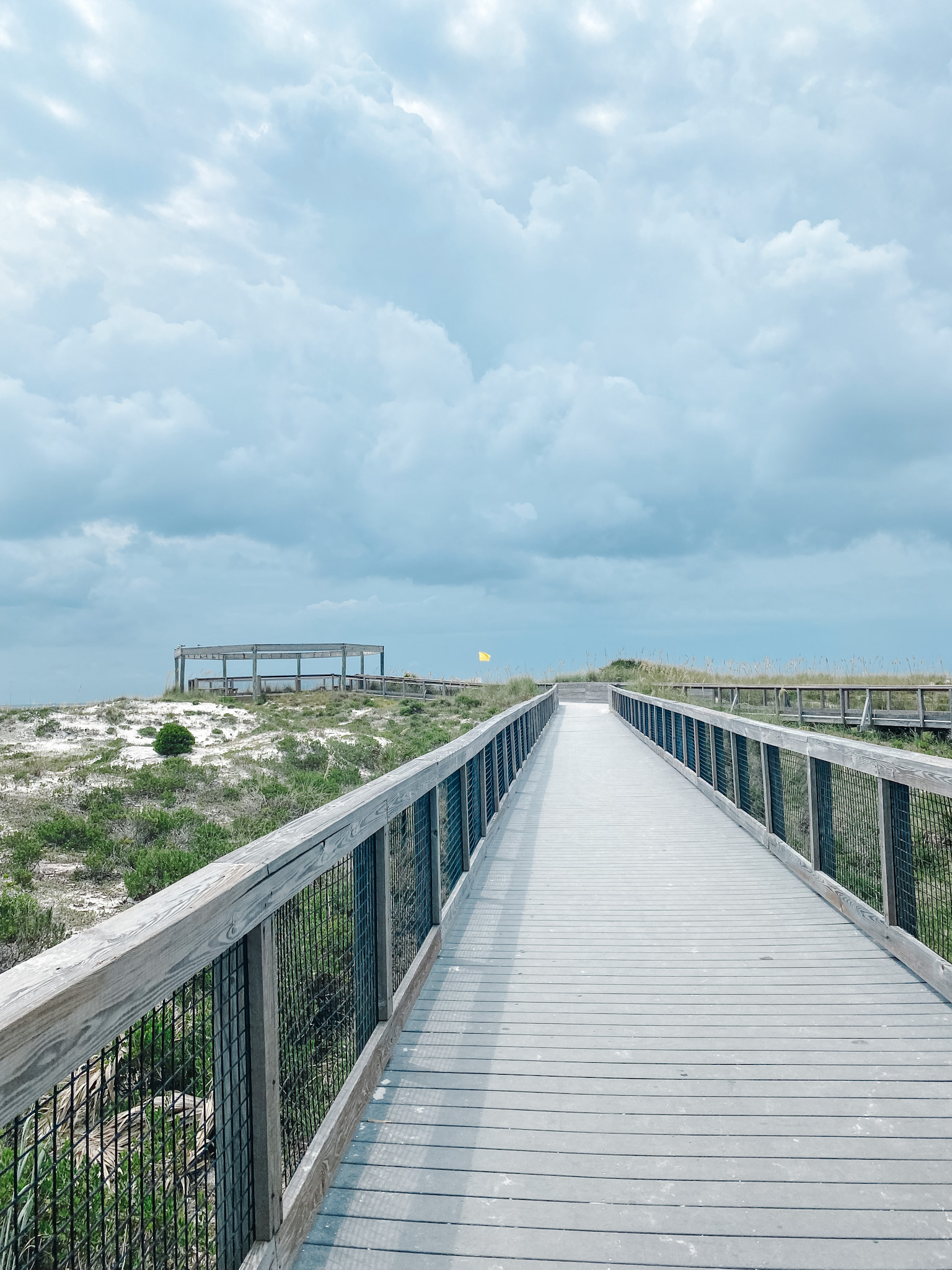 Panama City Beach Attractions by popular Memphis travel blog, Lone Star Looking Glass: image of a wooden boardwalk on Shipwreck Island. 