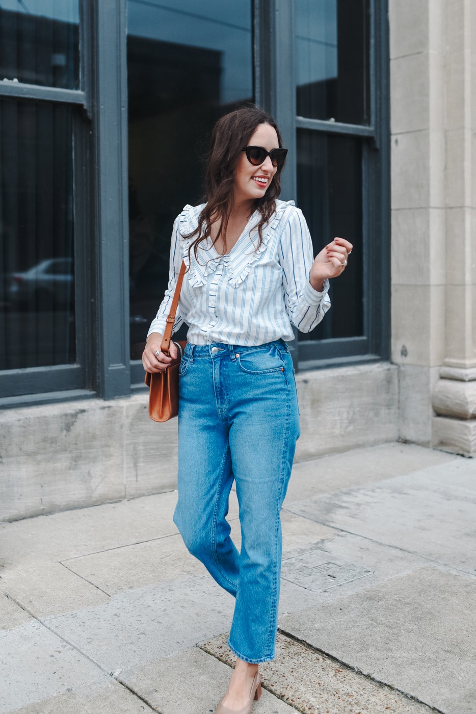 Ruffled Collar Shirts styled by top Memphis fashion blogger, Lone Star Looking Glass: image of a woman wearing an Anthropologie ruffled shirt