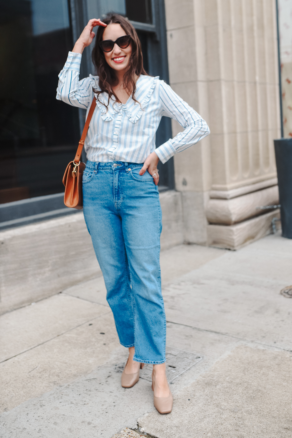 Ruffled Collar Shirts styled by top Memphis fashion blogger, Lone Star Looking Glass: image of a woman wearing an Anthropologie ruffled shirt