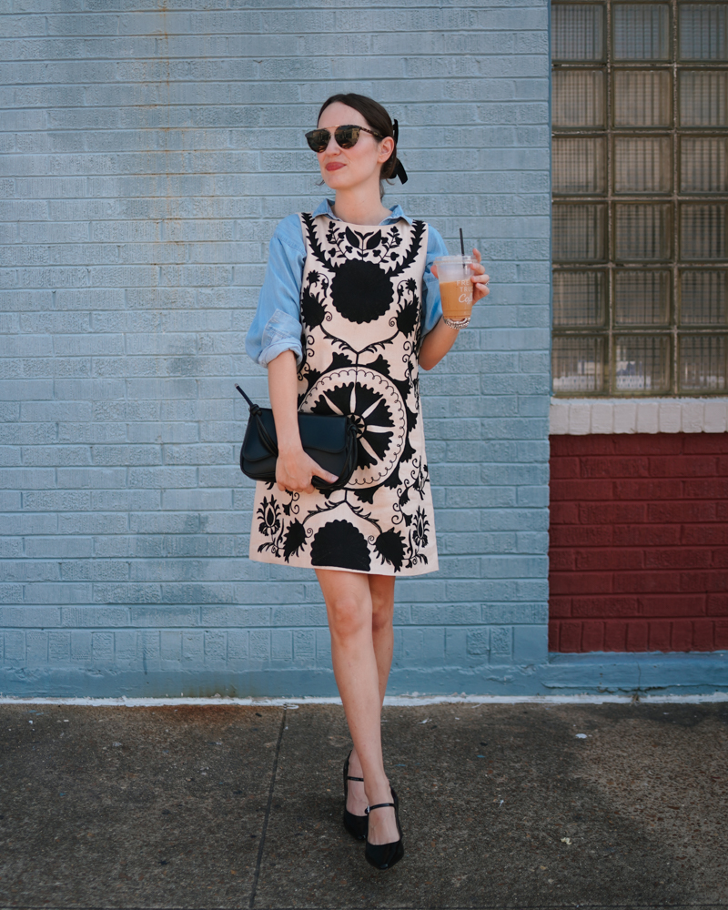 Dillards Black and Cream Embroidered Mini Dress. Layering a mini dress with a chambray button down.